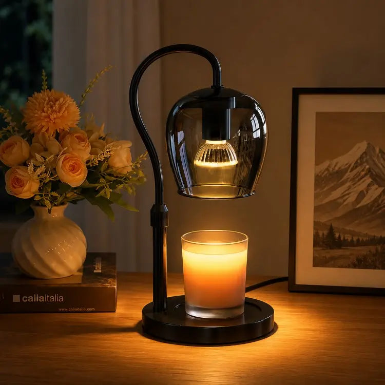 Black candle warmer lamp with timer and dimmer warming a scented jar candle on a wooden table in a modern living room