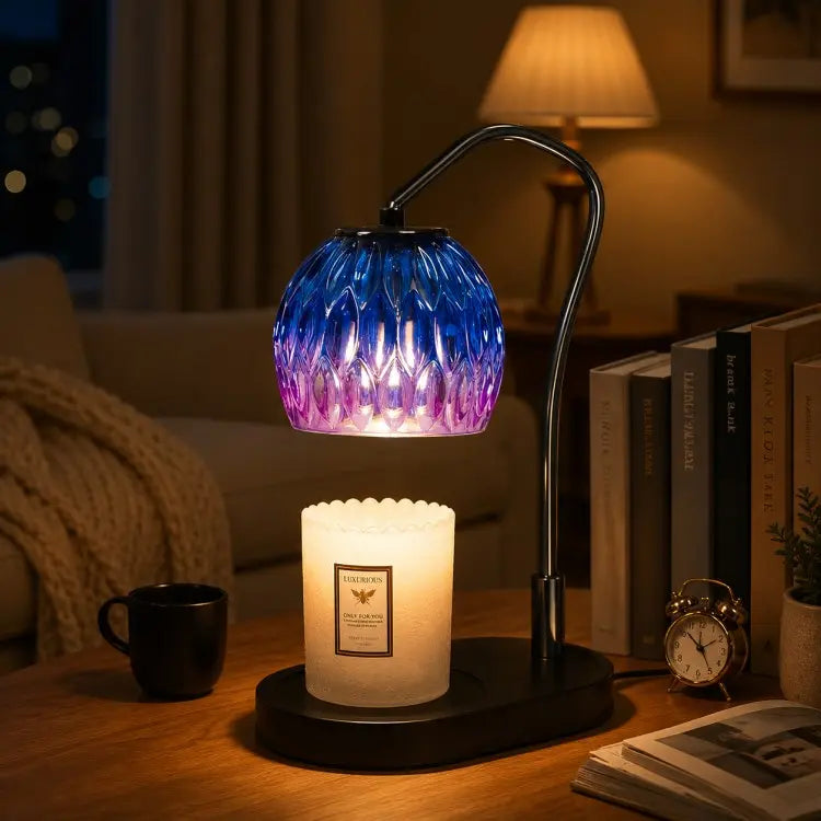 Black candle warmer lamp with timer and dimmer warming a scented jar candle on a wooden table in a modern living room