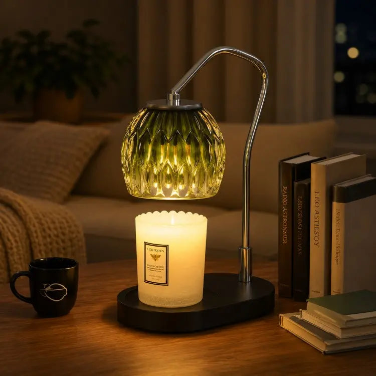 Black candle warmer lamp with timer and dimmer warming a scented jar candle on a wooden table in a modern living room