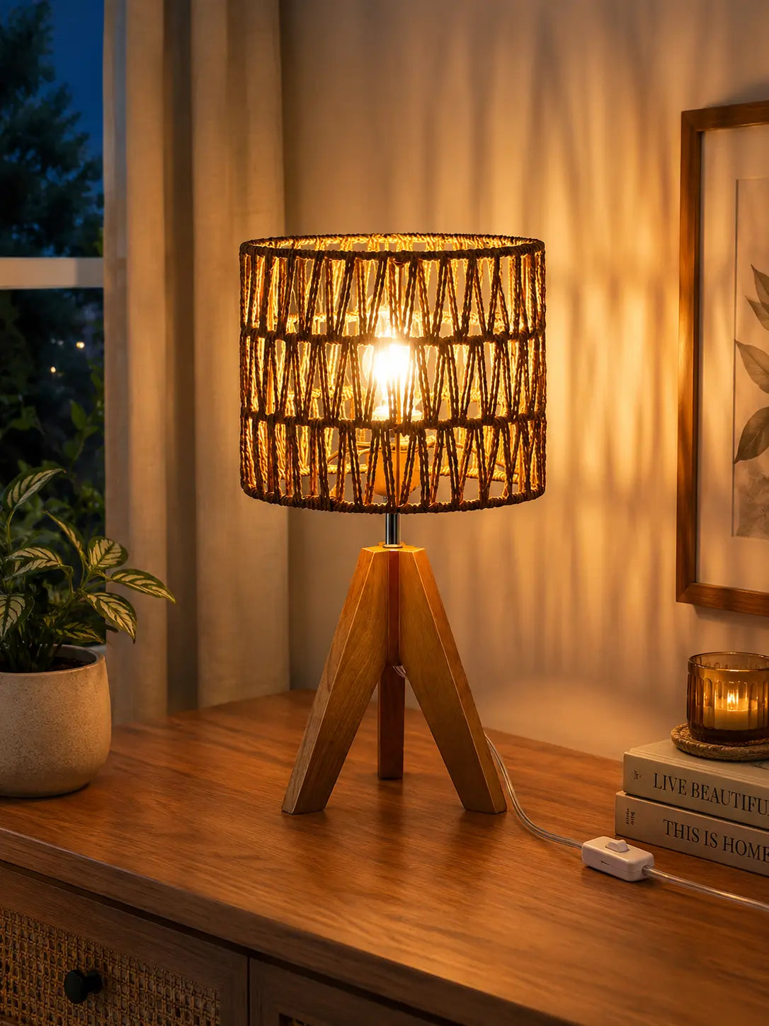 Modern wooden tripod table lamp with shade on a bedside table, perfect for bedroom, living room and cozy home lighting
